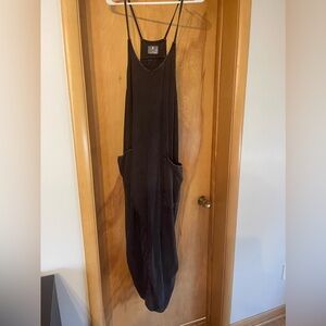 Free People Movement Hot Shot Onesie size L in washed black.